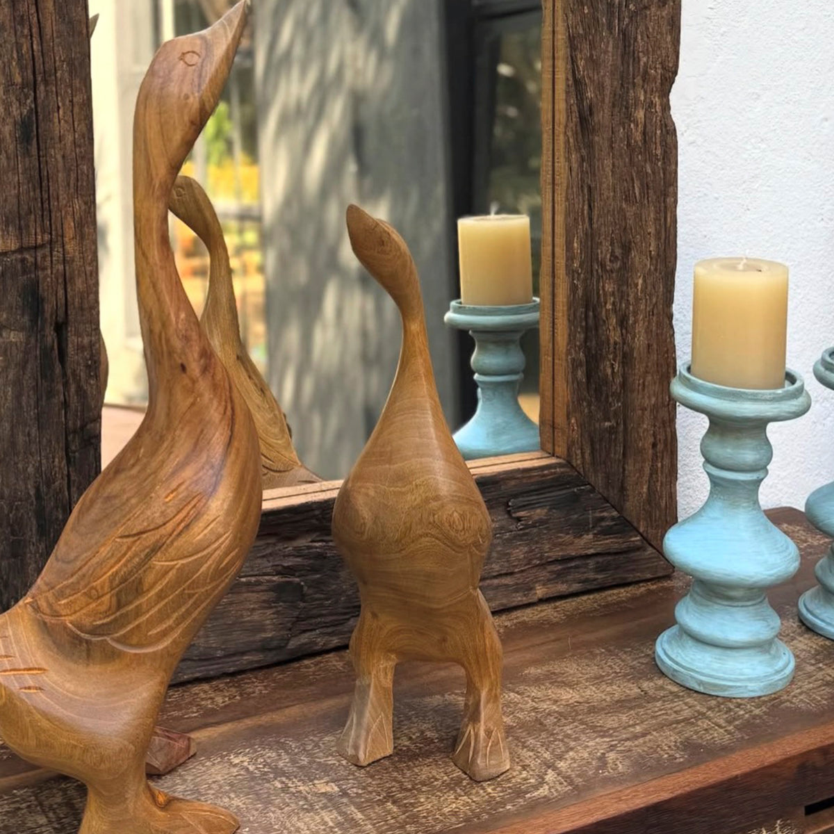 Gansos decorativos de madeira